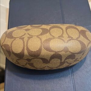 Coach Tan Patterned Eyewear Case.  Looks new on the outside. Inside good see pic
